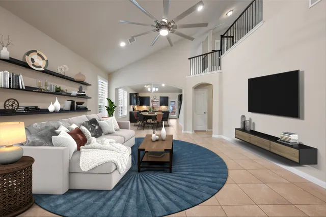 a living room with furniture and a flat screen tv