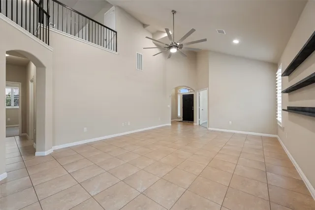 a view of an empty room with a bathroom