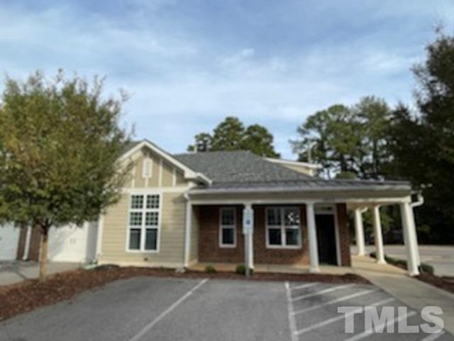 2820 Plumfield Place Raleigh, NC 27607 - Photo 1 of 23 front view of a house with a yard