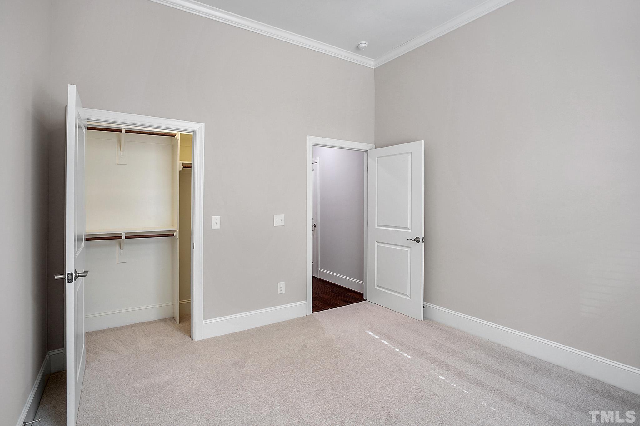 2820 Plumfield Place Raleigh, NC 27607 - Photo 15 of 23 an empty room with closet and a bathroom