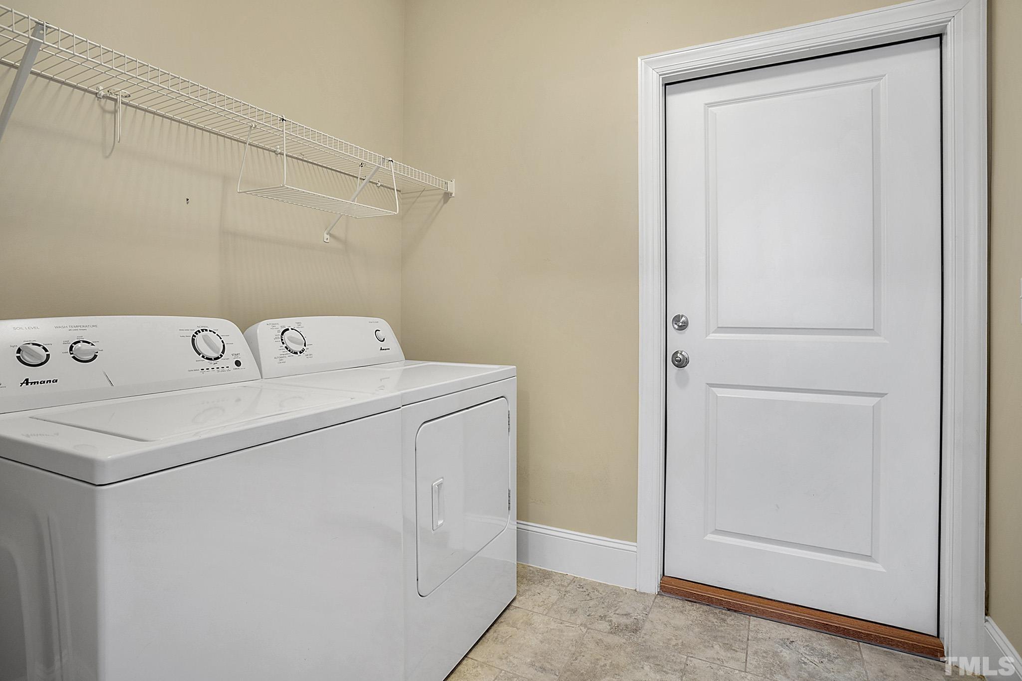 2820 Plumfield Place Raleigh, NC 27607 - Photo 20 of 23 a utility room with dryer and washer