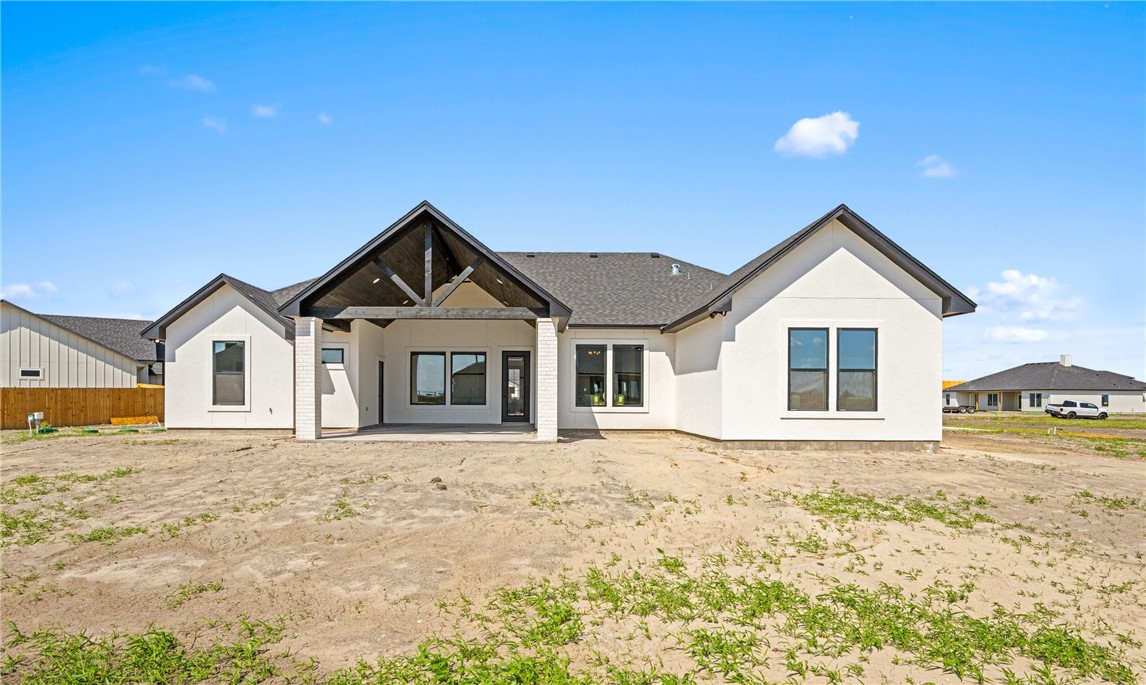 1517 Fenner Ranch Corpus Christi, TX 78415 - Photo 31 of 34 a front view of a house with a yard