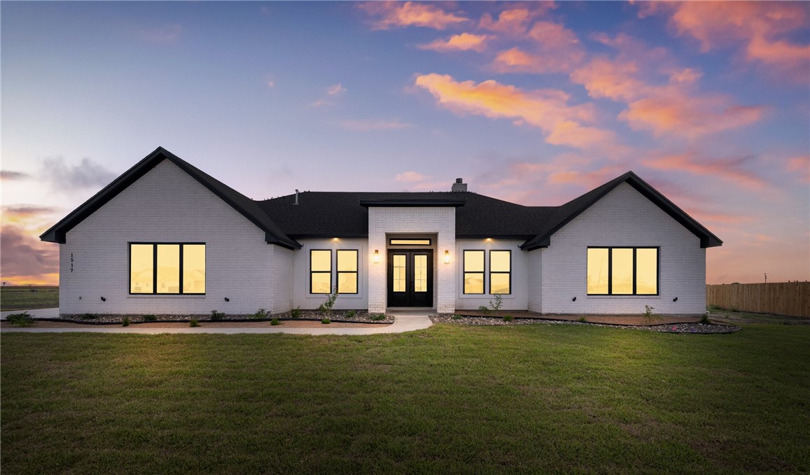 1517 Fenner Ranch Corpus Christi, TX 78415 - Photo 32 of 34 a front view of house with yard and entertaining space