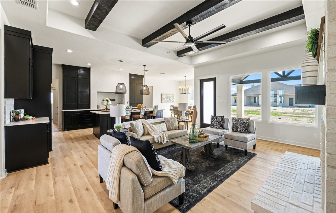 1517 Fenner Ranch Corpus Christi, TX 78415 - Photo 5 of 34 a living room with furniture kitchen view and a large window