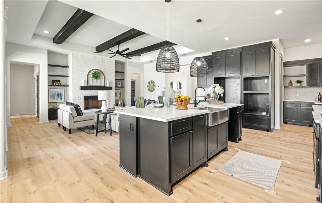 1517 Fenner Ranch Corpus Christi, TX 78415 - Photo 9 of 34 a living room with stainless steel appliances kitchen island granite countertop furniture and a view of living room