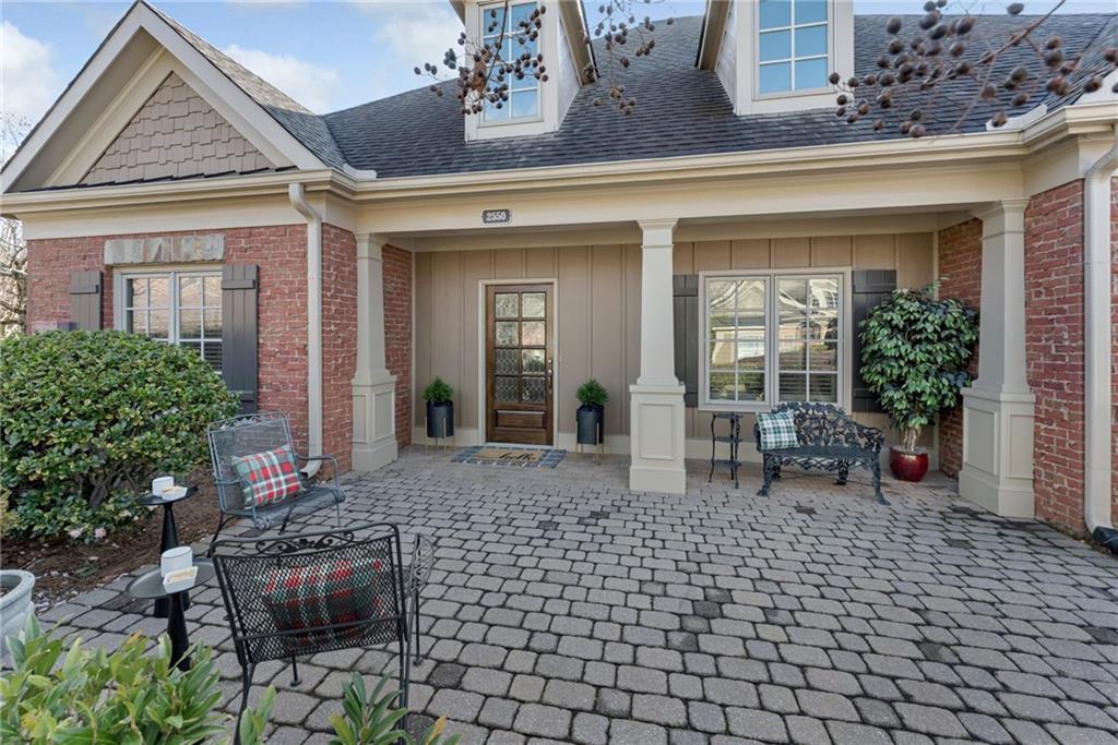 2550 Ballantrae Circle, Unit 53F Cumming, GA 30041 - Photo 1 of 46 a view of house with outdoor seating space