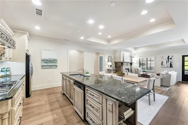 a utility room with cabinets washer and dryer