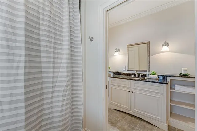 a picture of a bathroom with a shower