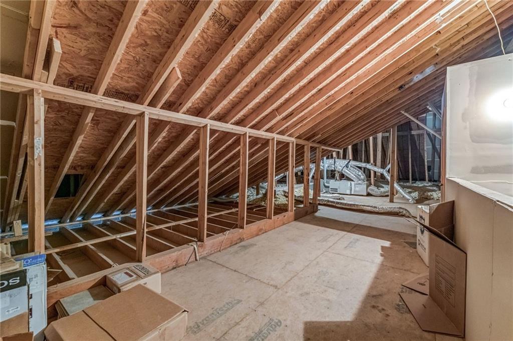 2550 Ballantrae Circle, Unit 53F Cumming, GA 30041 - Photo 32 of 46 a view of an empty room with wooden walls