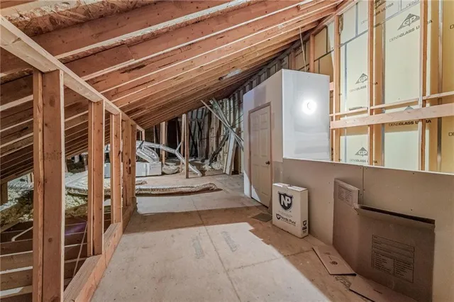 a view of a street with a building in the background