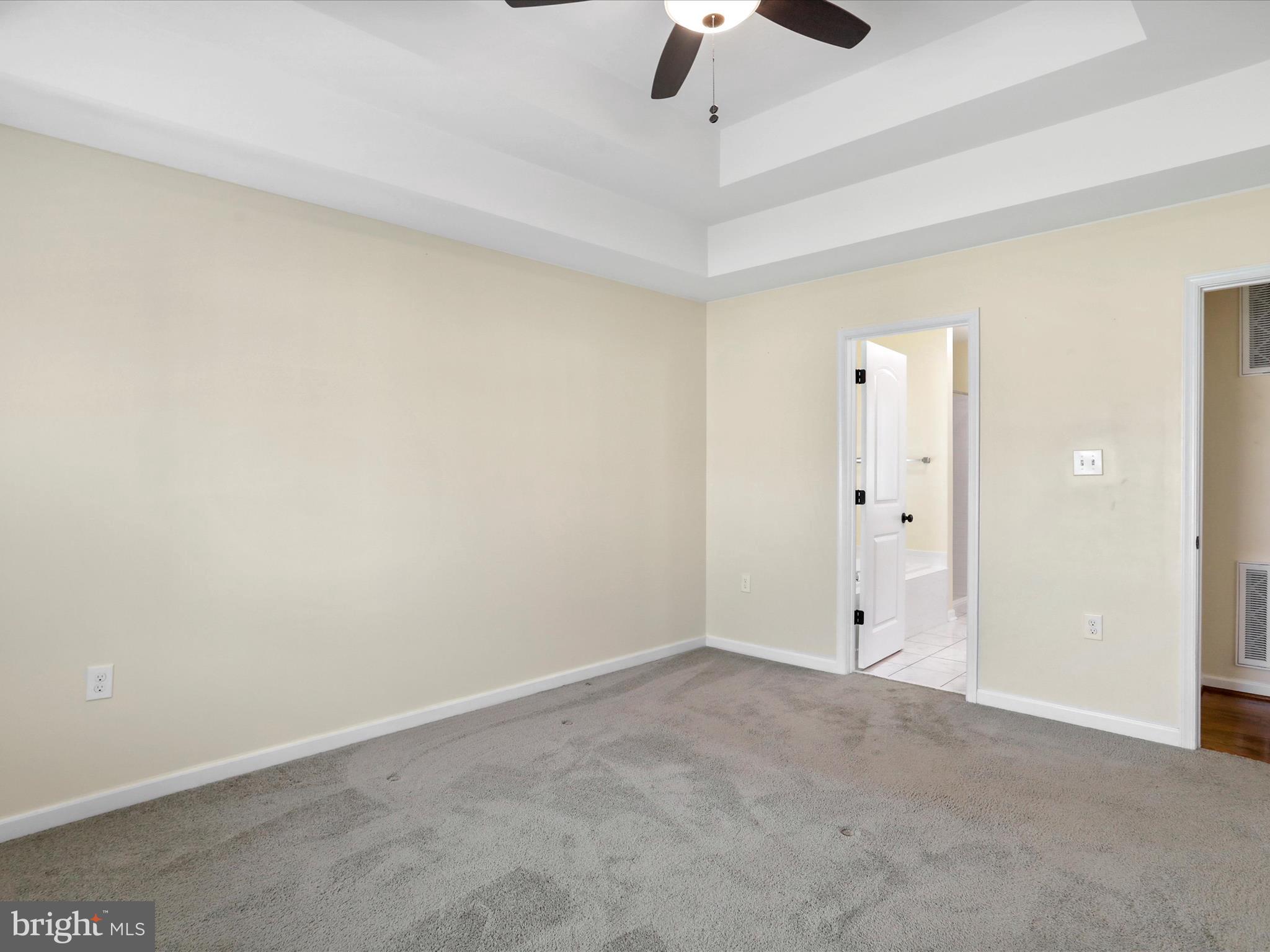 1613 Needy Road Martinsburg, WV 25405 - Photo 12 of 37 an empty room with a ceiling fan and a window