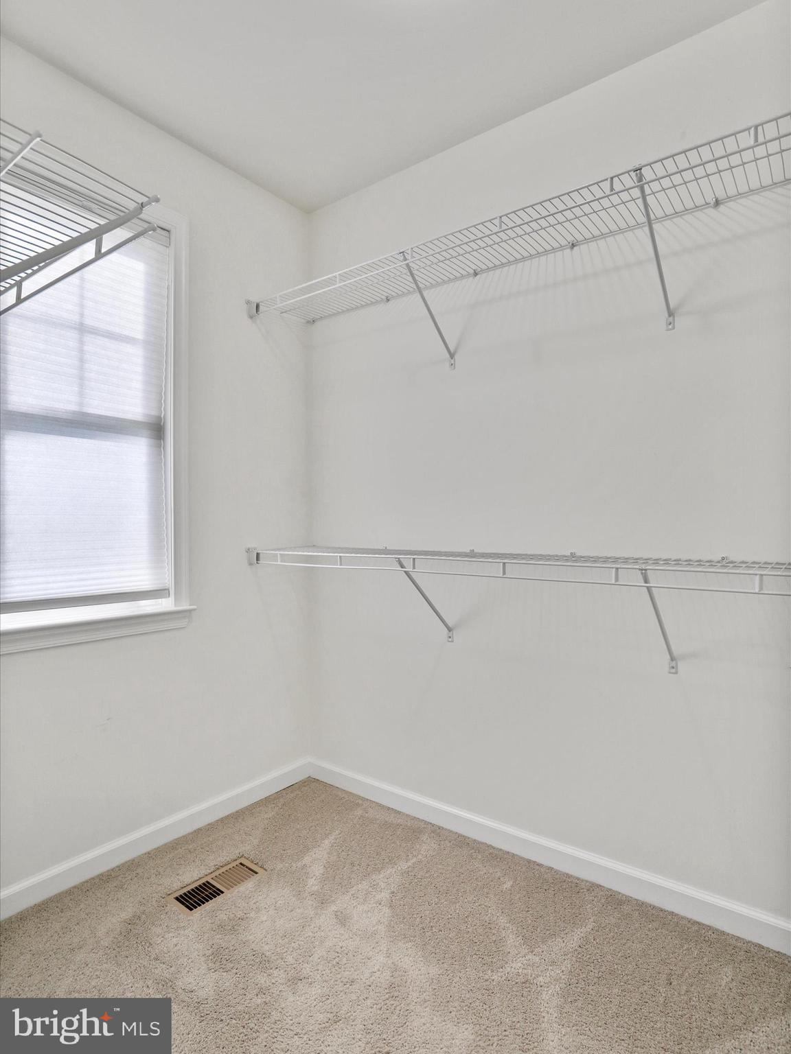 1613 Needy Road Martinsburg, WV 25405 - Photo 15 of 37 a view of a room with racks on the wall