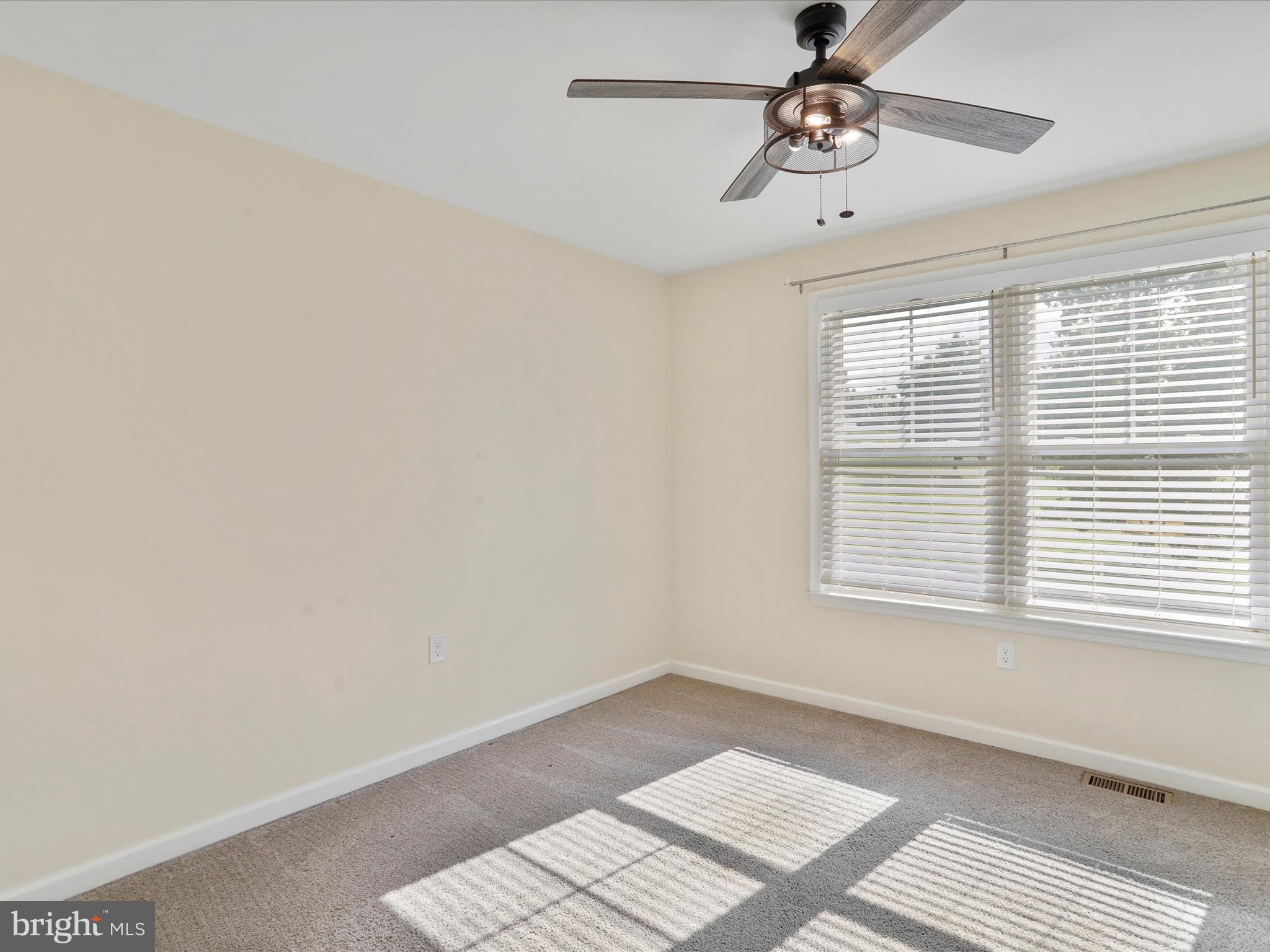 1613 Needy Road Martinsburg, WV 25405 - Photo 16 of 37 a view of a room with a window and ceiling fan