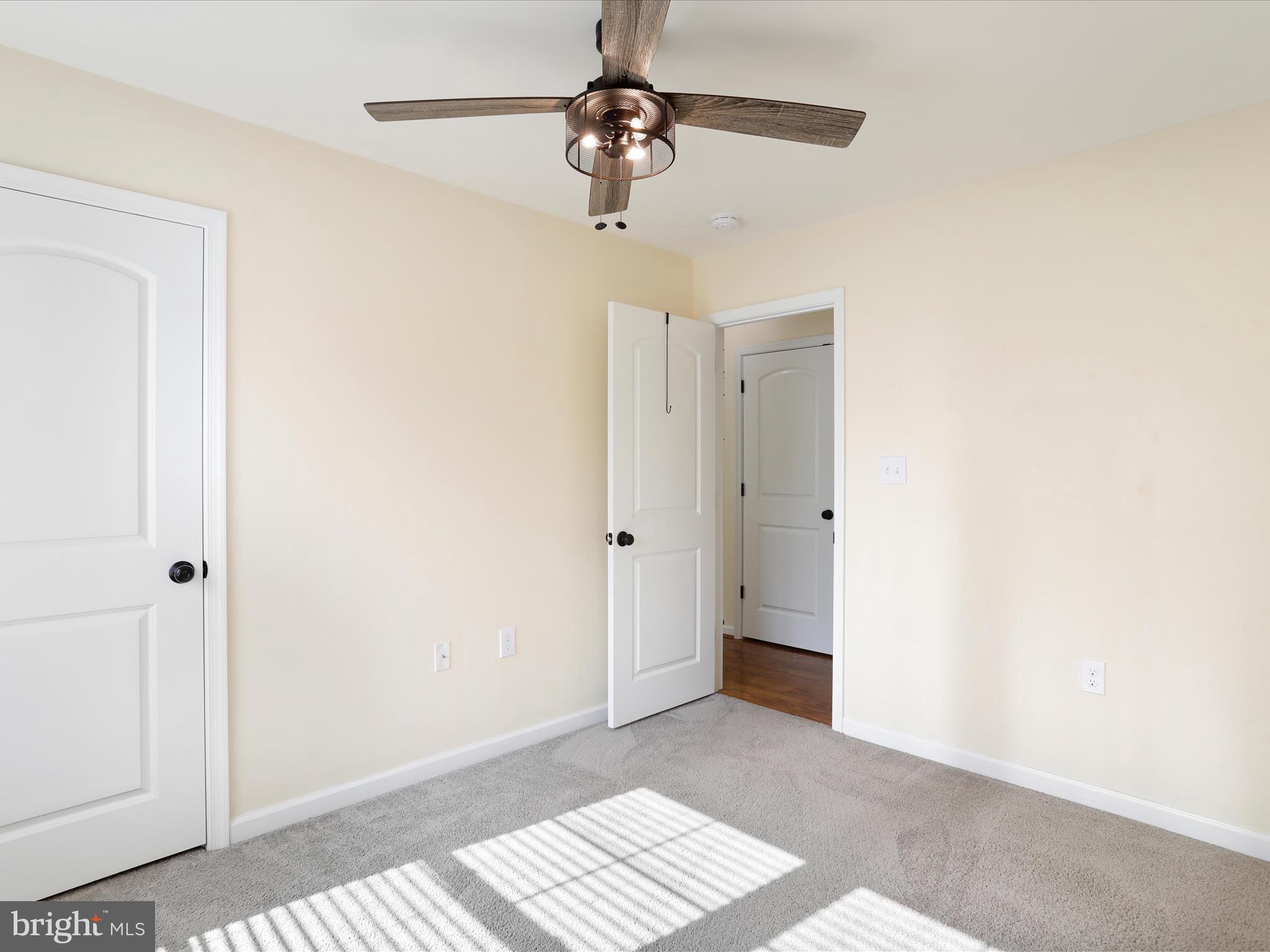 1613 Needy Road Martinsburg, WV 25405 - Photo 17 of 37 a view of an empty room with a window