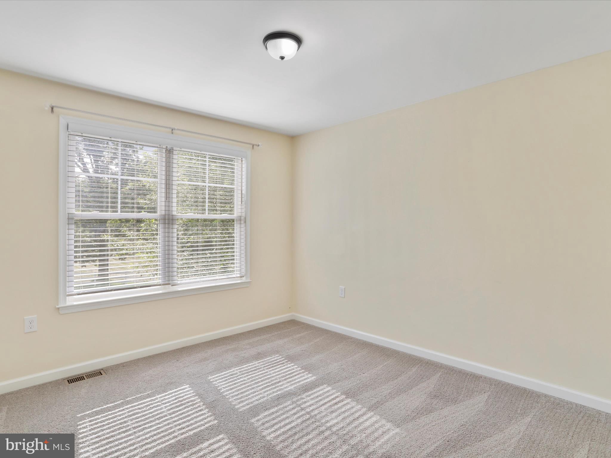 1613 Needy Road Martinsburg, WV 25405 - Photo 18 of 37 an empty room with a window