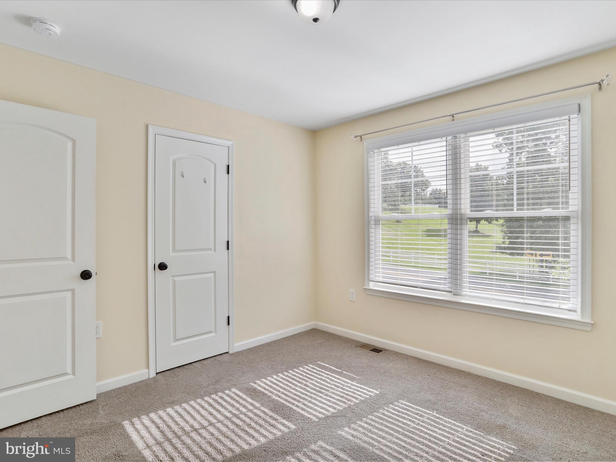 1613 Needy Road Martinsburg, WV 25405 - Photo 19 of 37 a view of an empty room with a window