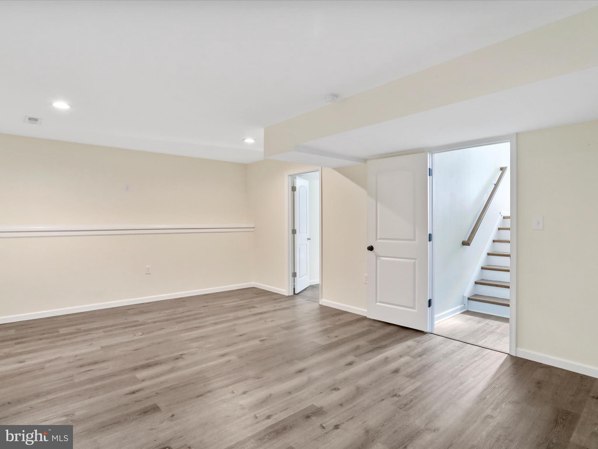 1613 Needy Road Martinsburg, WV 25405 - Photo 25 of 37 a view of an empty room with wooden floor