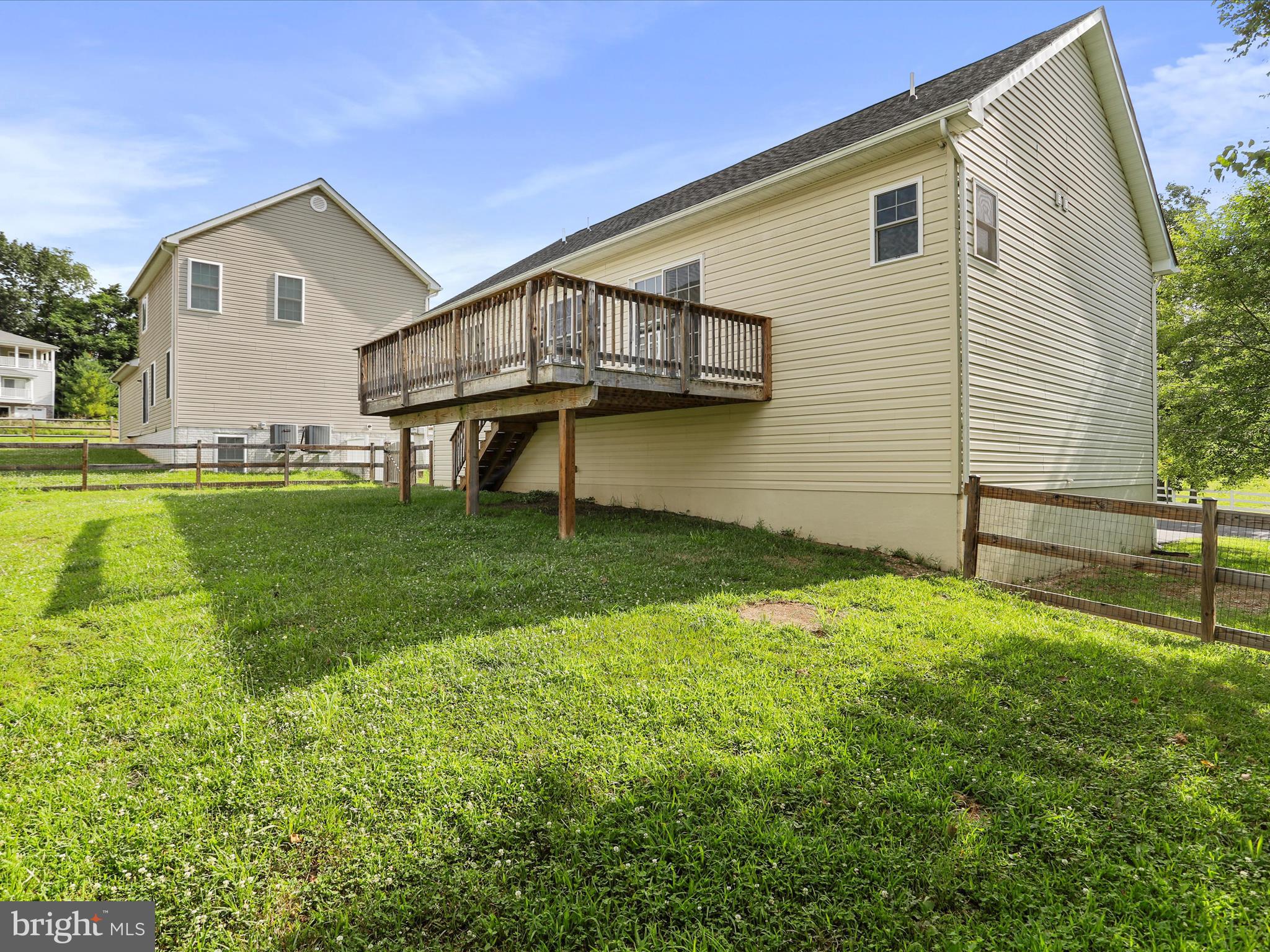 1613 Needy Road Martinsburg, WV 25405 - Photo 32 of 37 a view of an house with backyard space and swimming pool