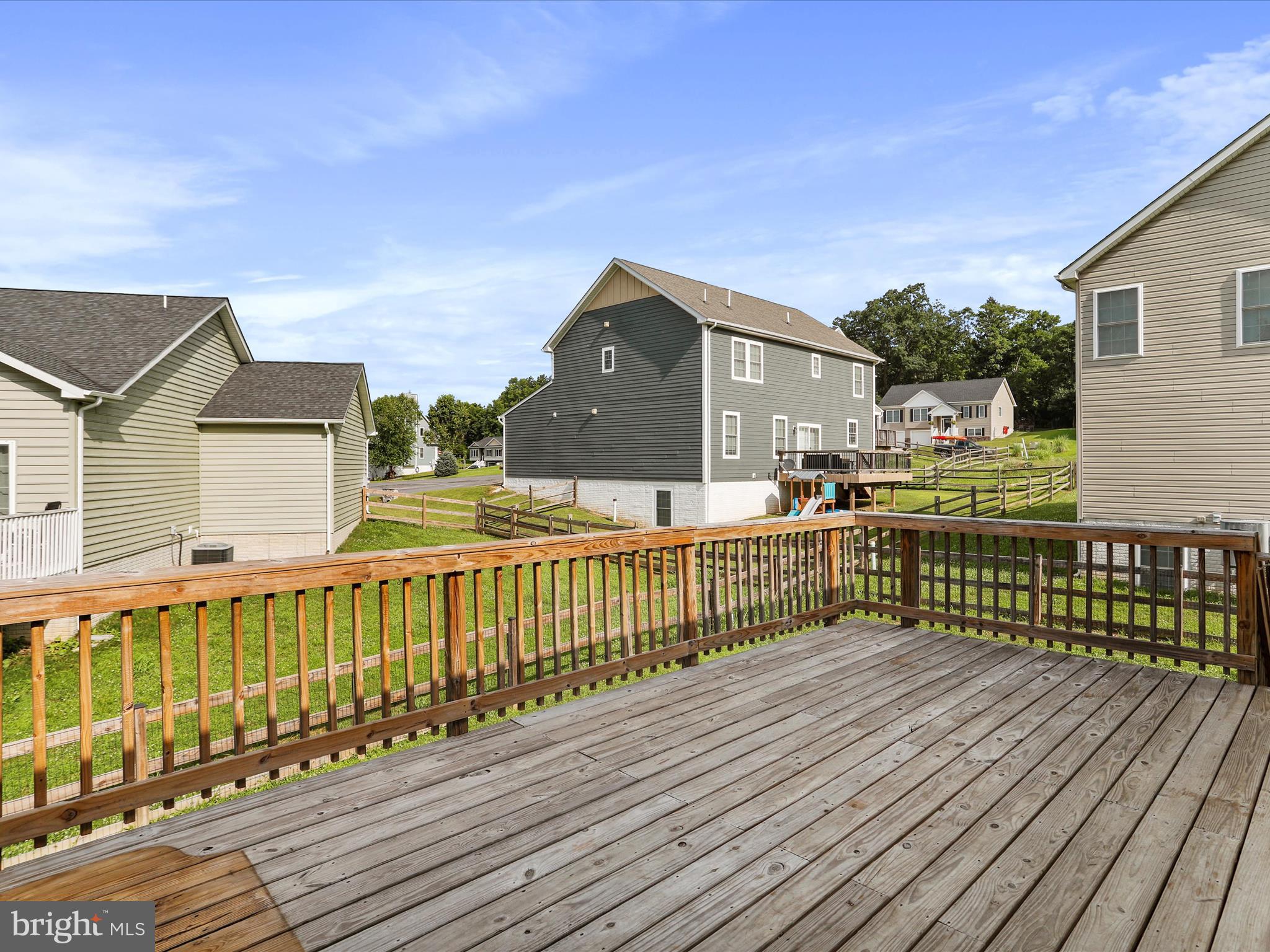 1613 Needy Road Martinsburg, WV 25405 - Photo 34 of 37 a view of a house with a wooden deck