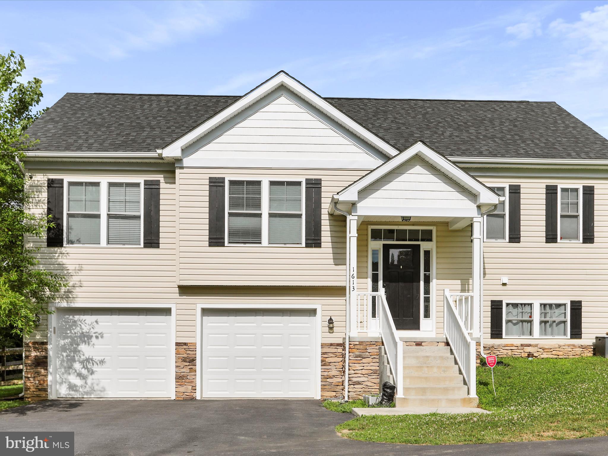 1613 Needy Road Martinsburg, WV 25405 - Photo 35 of 37 a front view of a house with a yard