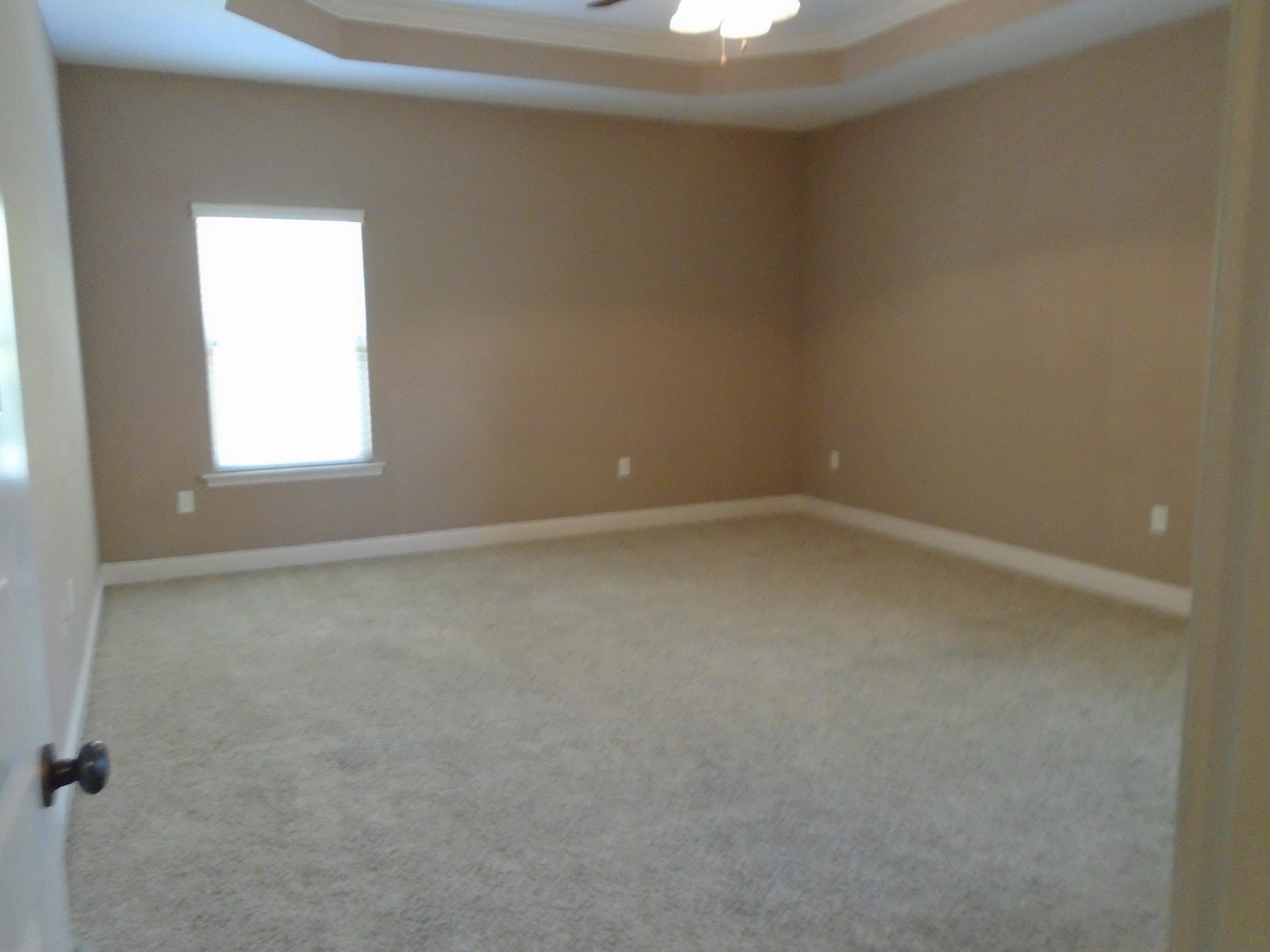 672 Red Fern Road Crestview, FL 32536 - Photo 11 of 27 an empty room with a window