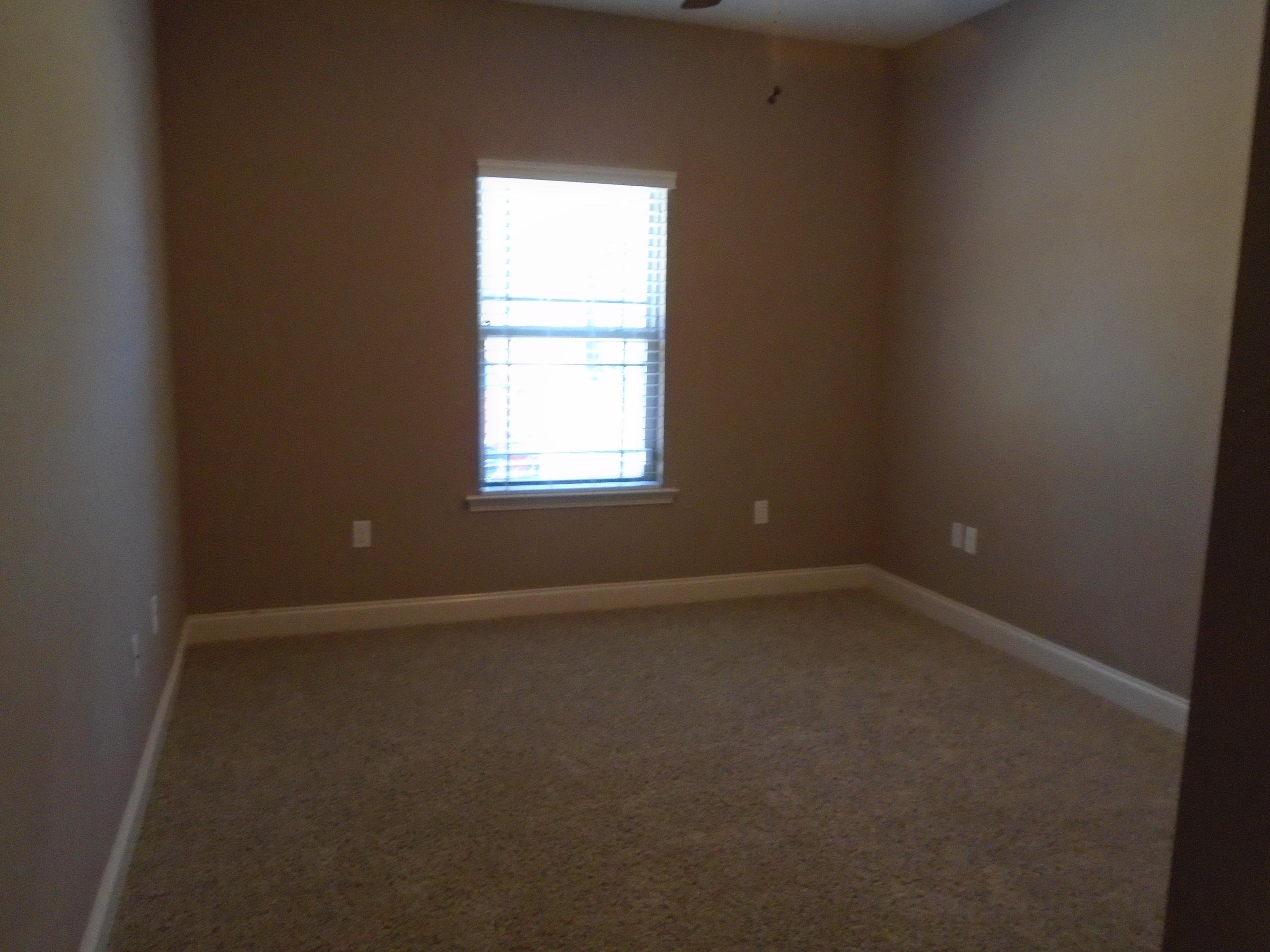 672 Red Fern Road Crestview, FL 32536 - Photo 17 of 27 an empty room with a window