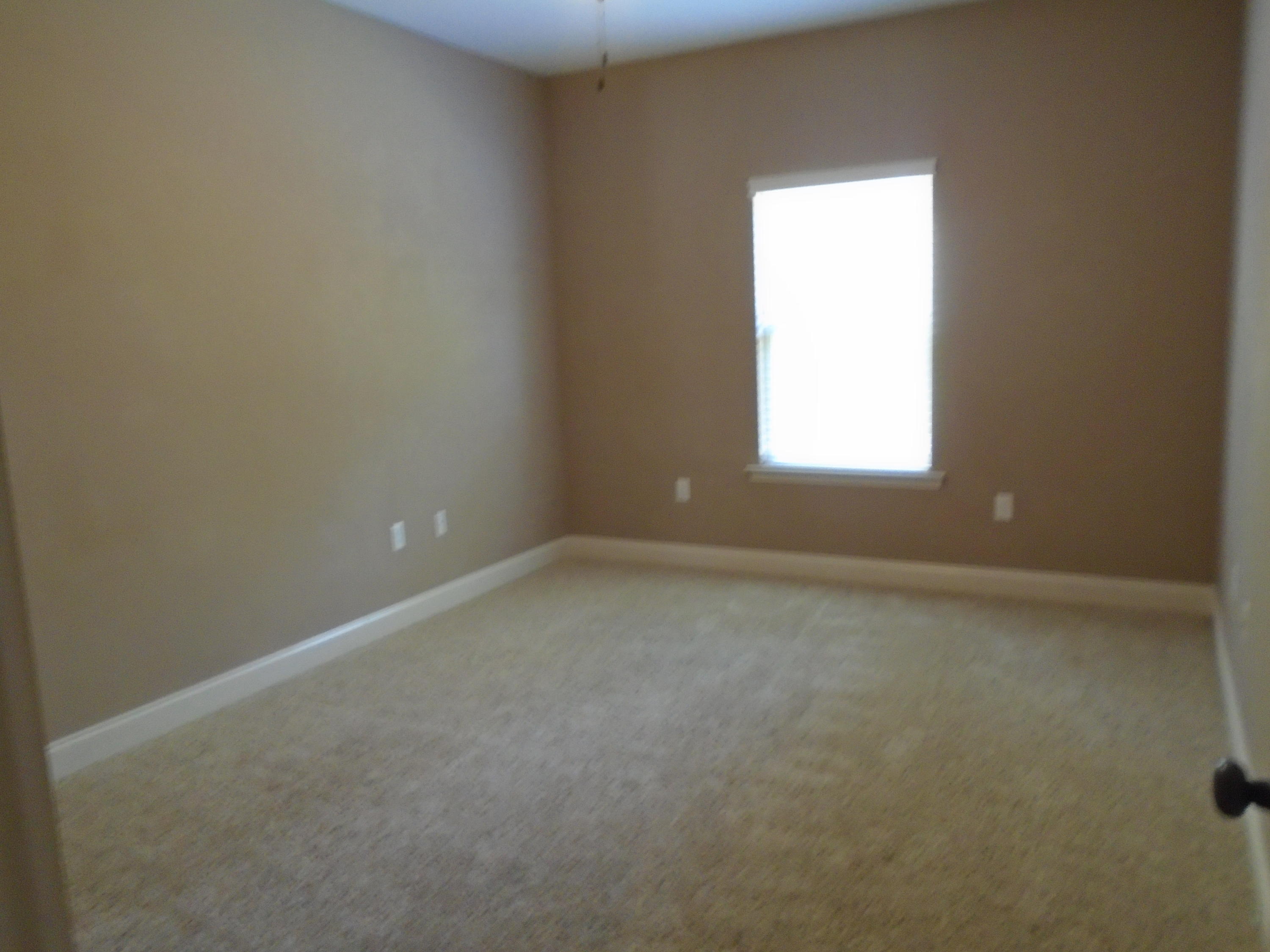 672 Red Fern Road Crestview, FL 32536 - Photo 19 of 27 an empty room with a window
