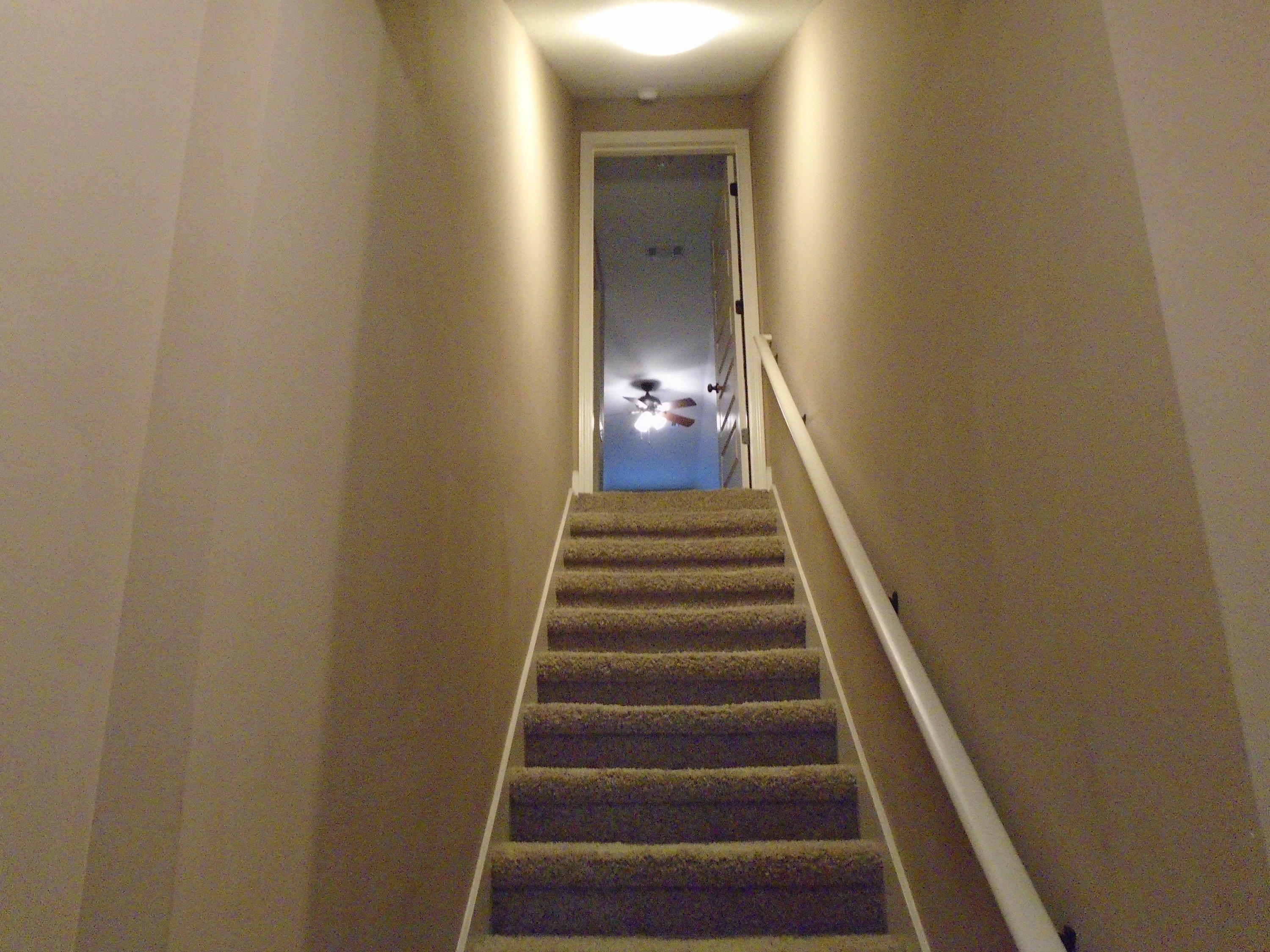 672 Red Fern Road Crestview, FL 32536 - Photo 20 of 27 a view of a hallway with wooden floor and entryway