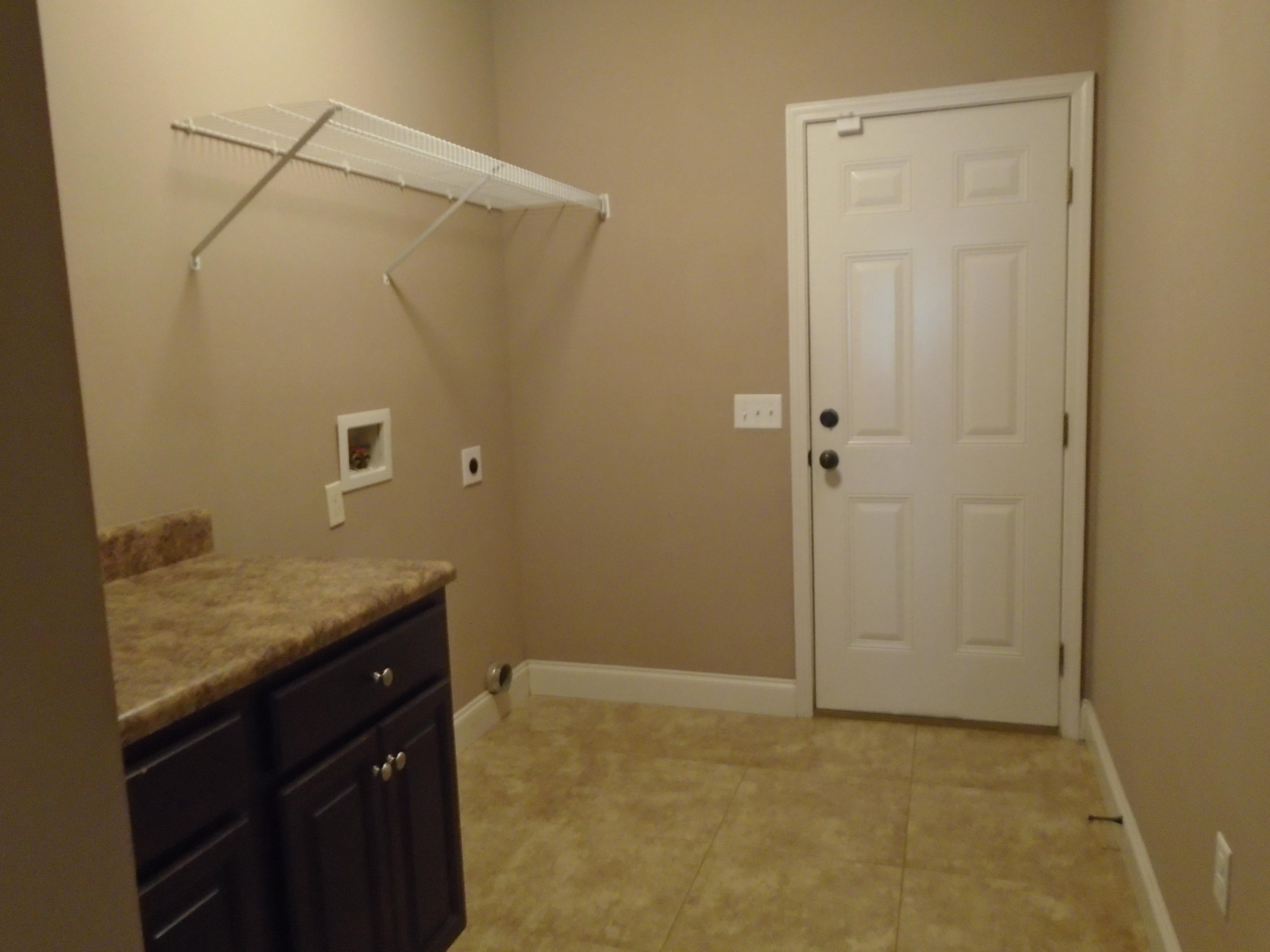 672 Red Fern Road Crestview, FL 32536 - Photo 23 of 27 a bathroom with a granite countertop sink and a mirror