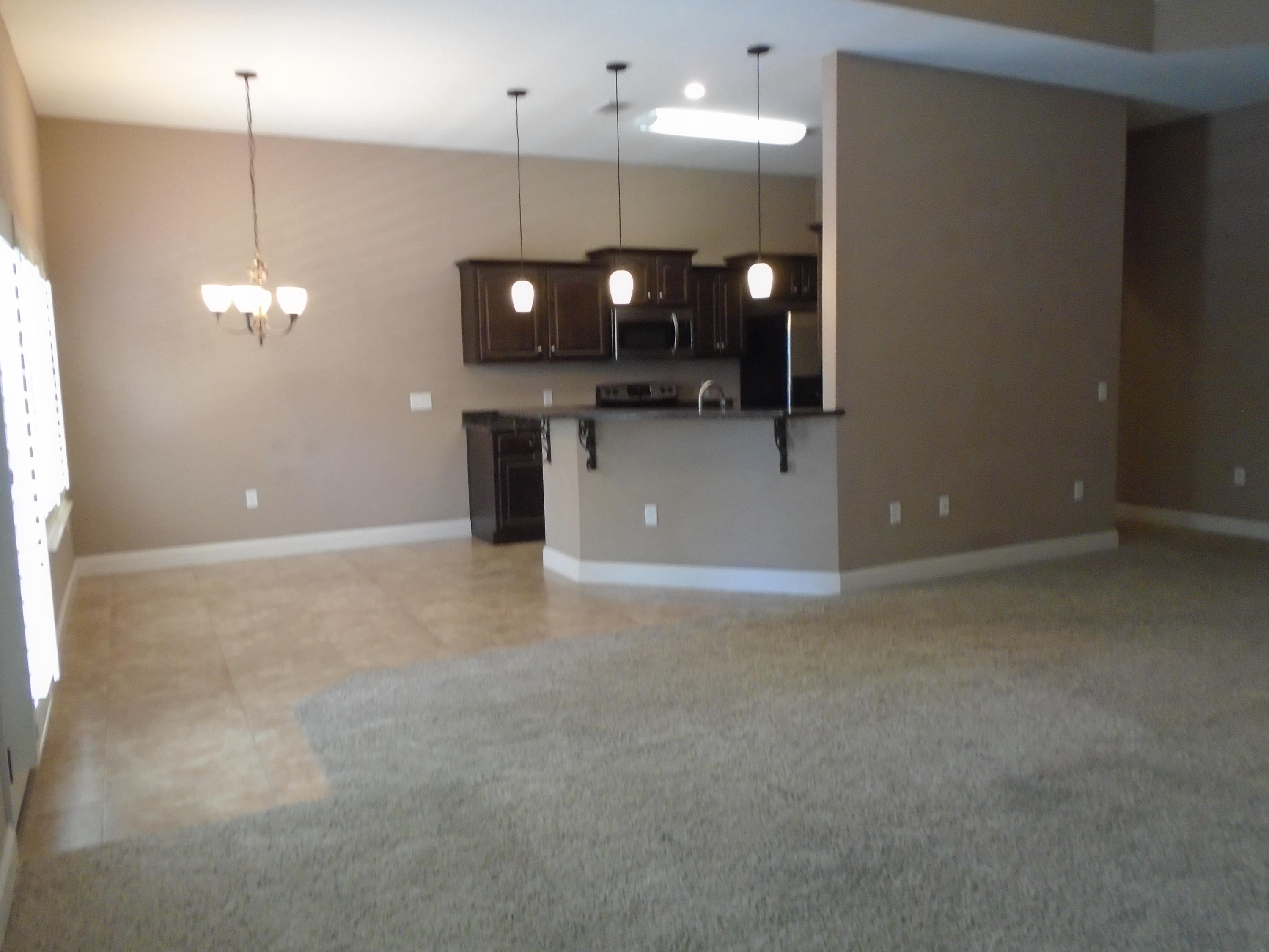 672 Red Fern Road Crestview, FL 32536 - Photo 6 of 27 a view of an empty room with a fireplace
