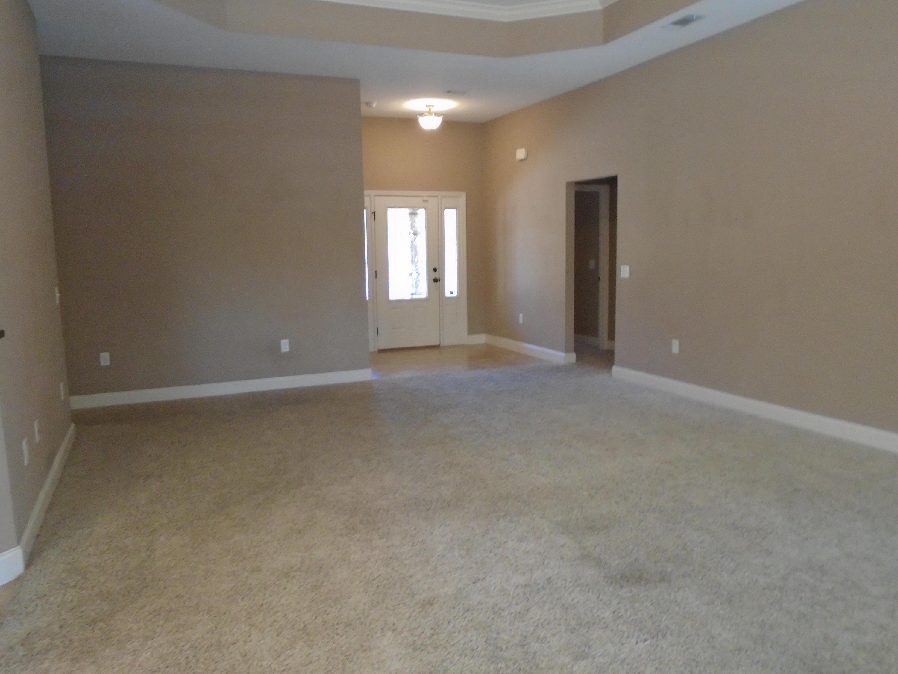 672 Red Fern Road Crestview, FL 32536 - Photo 9 of 27 an empty room with windows and closet