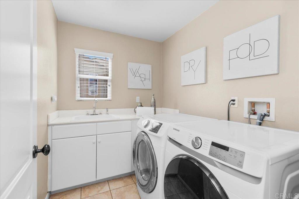 838 Luminara Way San Marcos, CA 92078 - Photo 45 of 54 a utility room with dryer and washer
