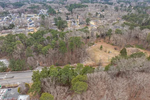 a view of a yard with trees