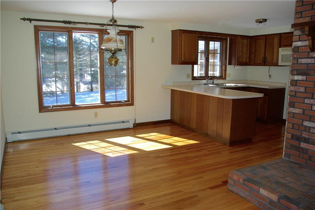 422 Pool Street Biddeford, ME 04005 - Photo 4 of 12 Dining and kitchen area overlooking...