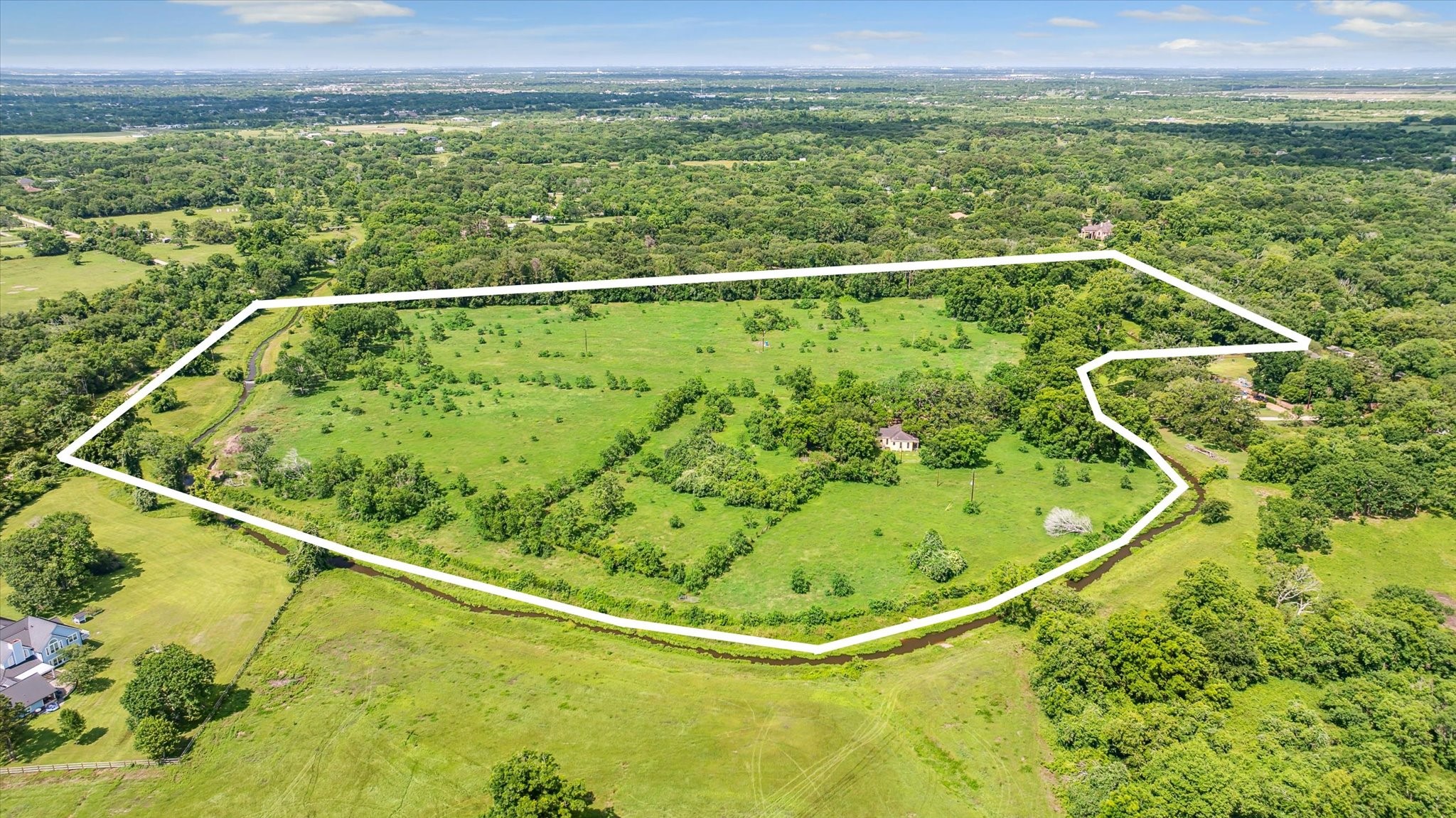 a view of a swimming pool and a chairs