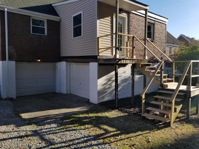 320 Scene Ridge Road McKeesport, PA 15133 - Photo 16 of 18 For those who love to tinker or who have lots of toys to store, there is plenty of room in the two, single car garages! Steps lead up to the rear den/office/bonus room off of kitchen! Back yard bordered by woods!!! Tinker and hobby to relax, access the woods to walk/hike and reprogram!