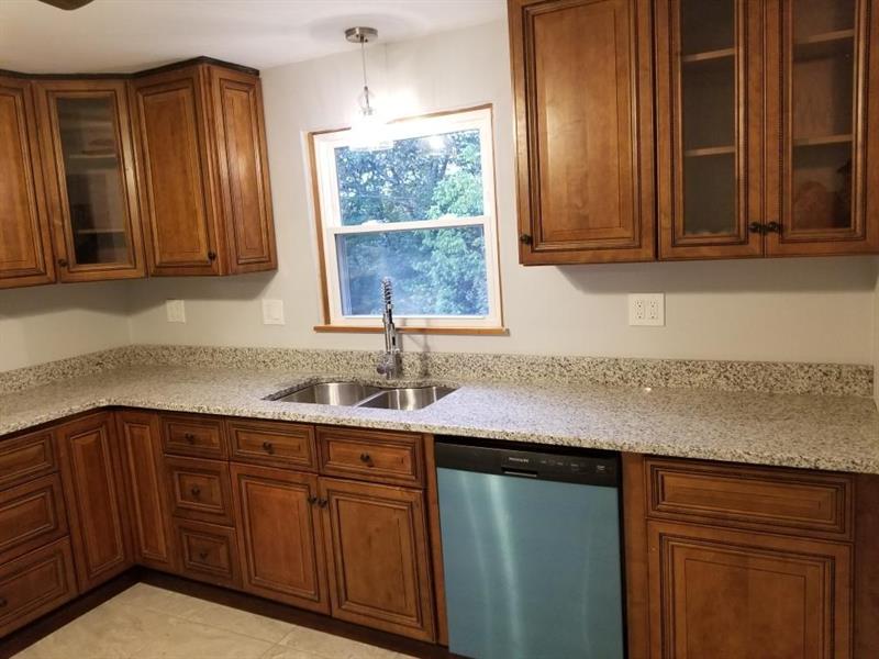 320 Scene Ridge Road McKeesport, PA 15133 - Photo 8 of 18 Just off the dining room is the fully equipped, newly remodeled oak kitchen.