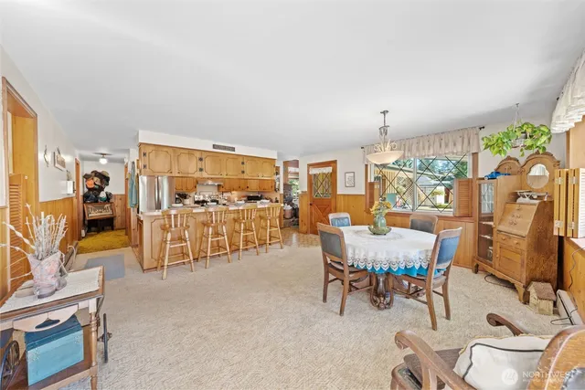 a view of a livingroom with furniture window and outside view