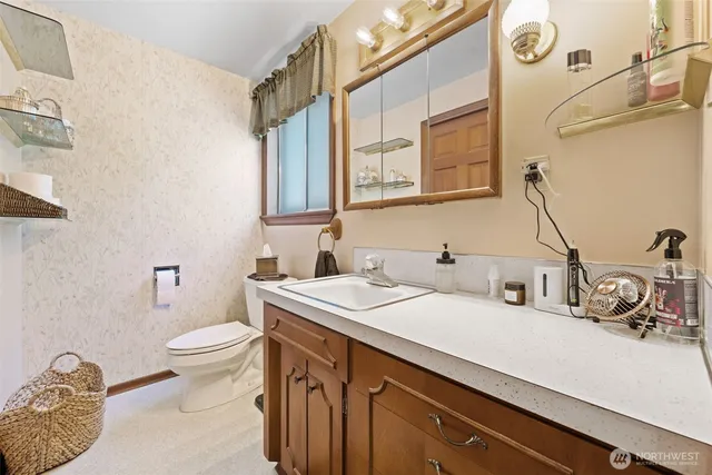 a bathroom with a tub and a shower