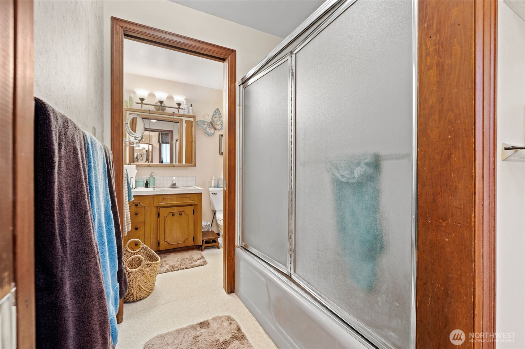 1906 164th Street South Spanaway, WA 98387 - Photo 18 of 35 a bathroom with a tub and a shower