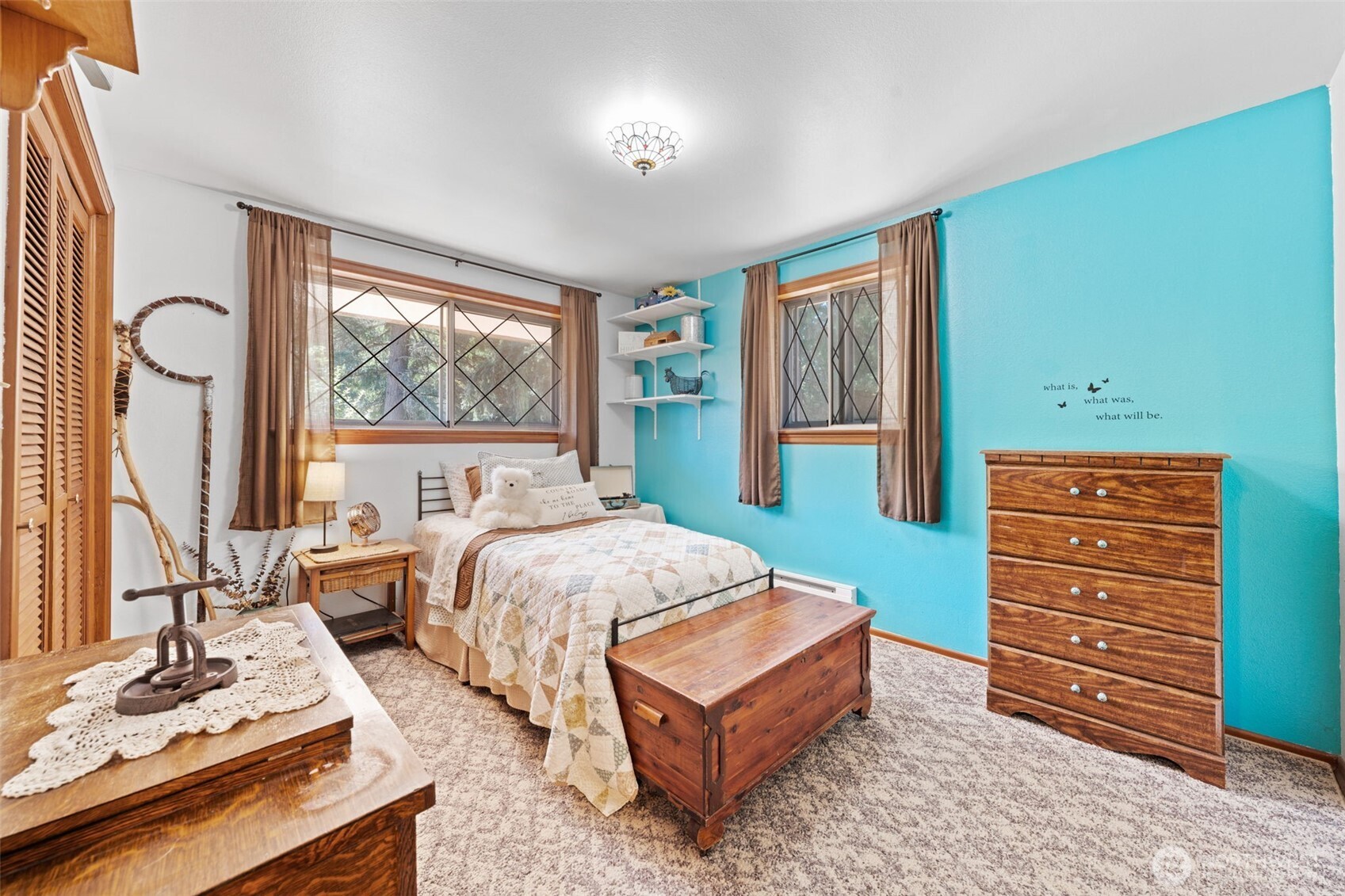 1906 164th Street South Spanaway, WA 98387 - Photo 19 of 35 a bedroom with a bed window and a dresser