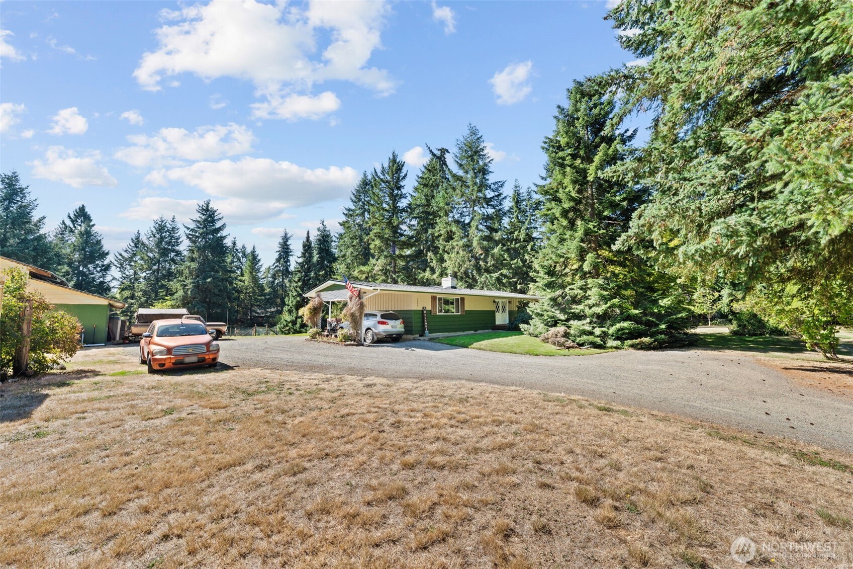 1906 164th Street South Spanaway, WA 98387 - Photo 2 of 35 a car parked on the side of the road
