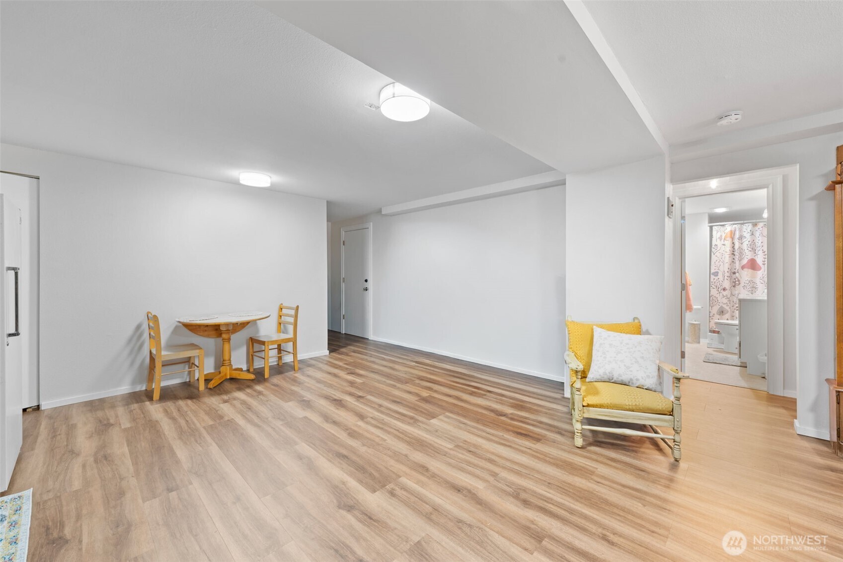 1906 164th Street South Spanaway, WA 98387 - Photo 23 of 35 a view of a livingroom with wooden furniture and a couch