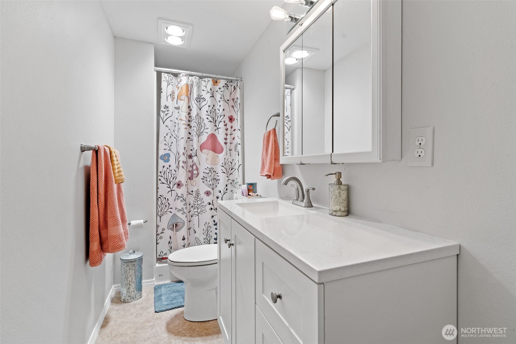 1906 164th Street South Spanaway, WA 98387 - Photo 25 of 35 a bathroom with a sink toilet and shower
