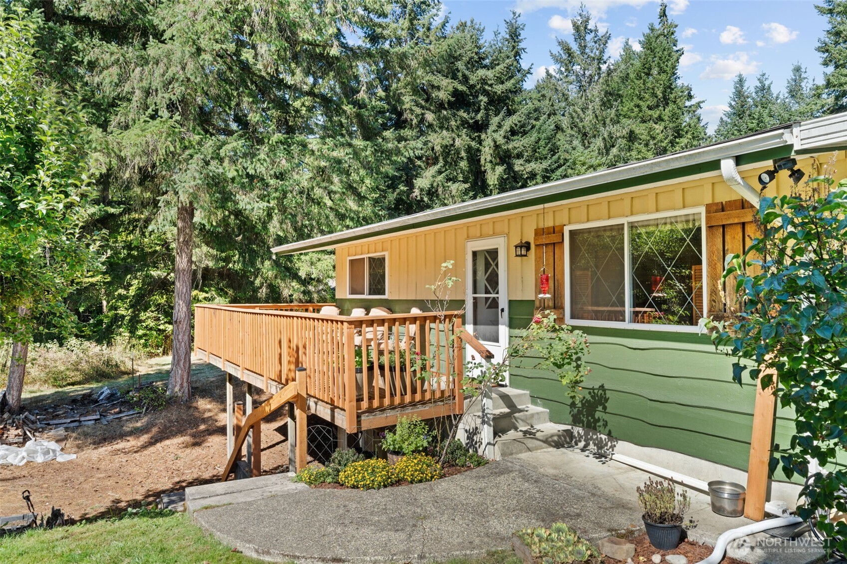 1906 164th Street South Spanaway, WA 98387 - Photo 27 of 35 a view of a house with a yard and sitting area