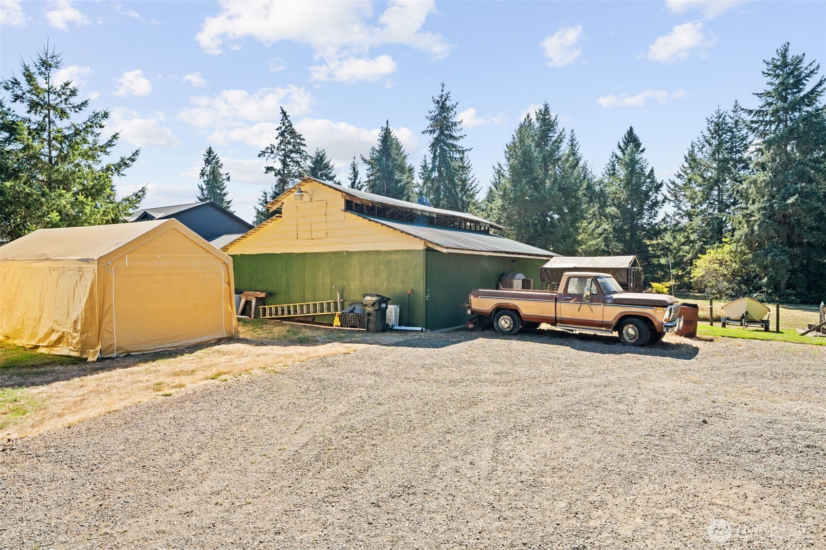 1906 164th Street South Spanaway, WA 98387 - Photo 31 of 35 a view of a car park in front of house
