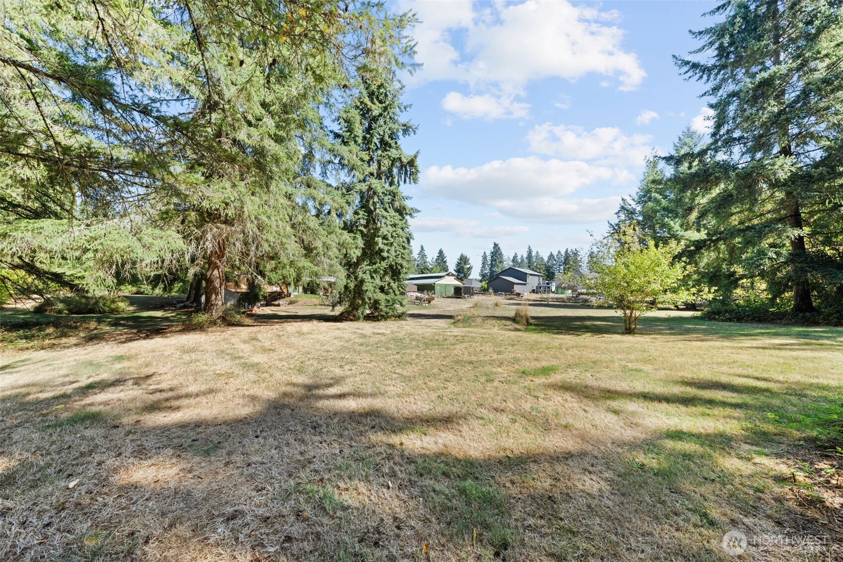 1906 164th Street South Spanaway, WA 98387 - Photo 35 of 35 a view of swimming pool with a yard