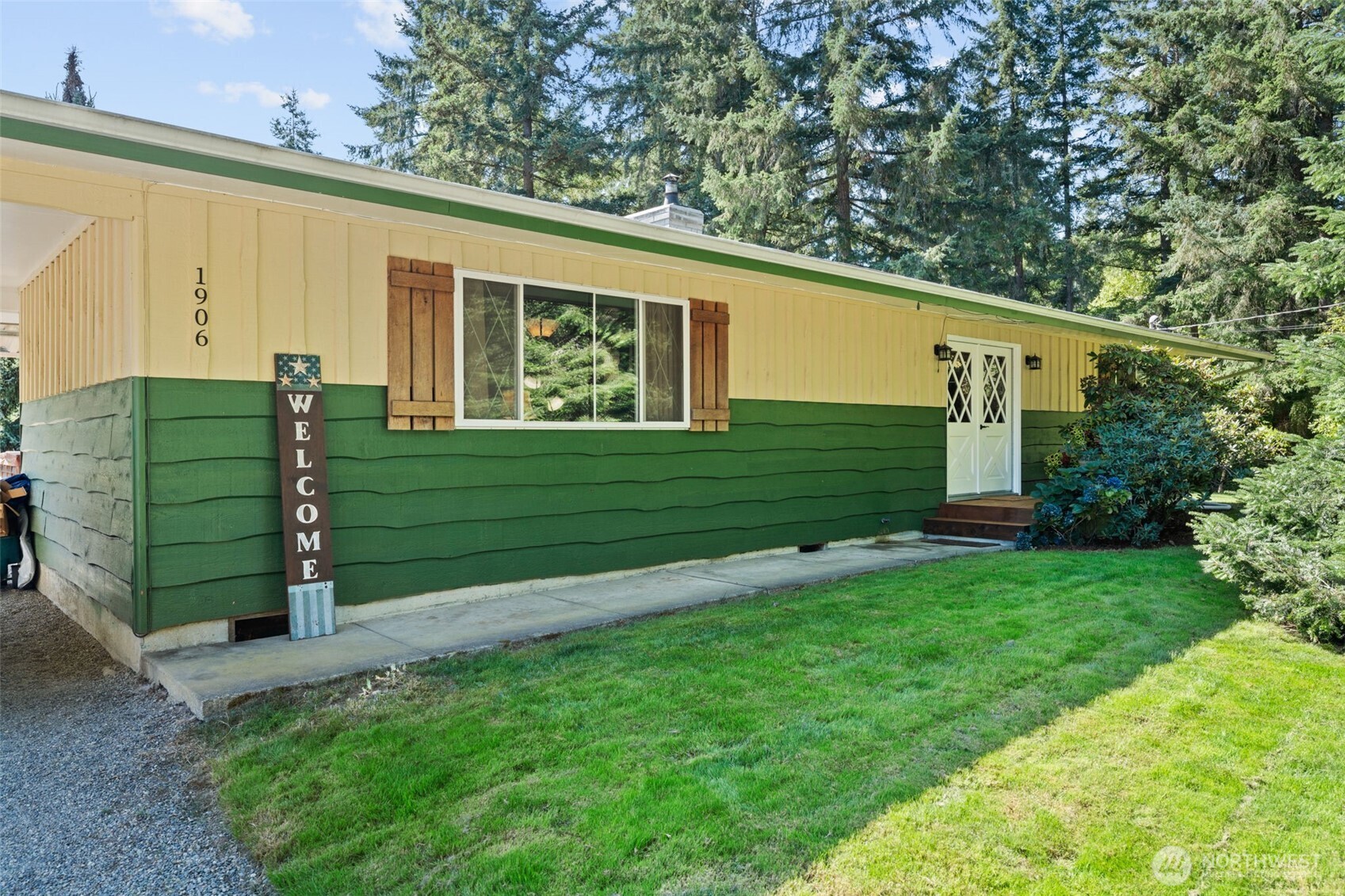 1906 164th Street South Spanaway, WA 98387 - Photo 4 of 35 a view of a house with a backyard