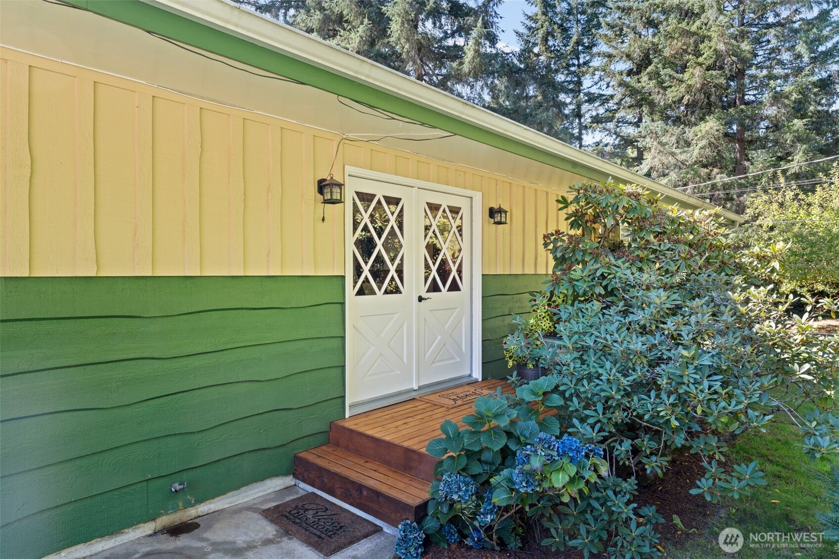 1906 164th Street South Spanaway, WA 98387 - Photo 5 of 35 a sign that is on the side of a building