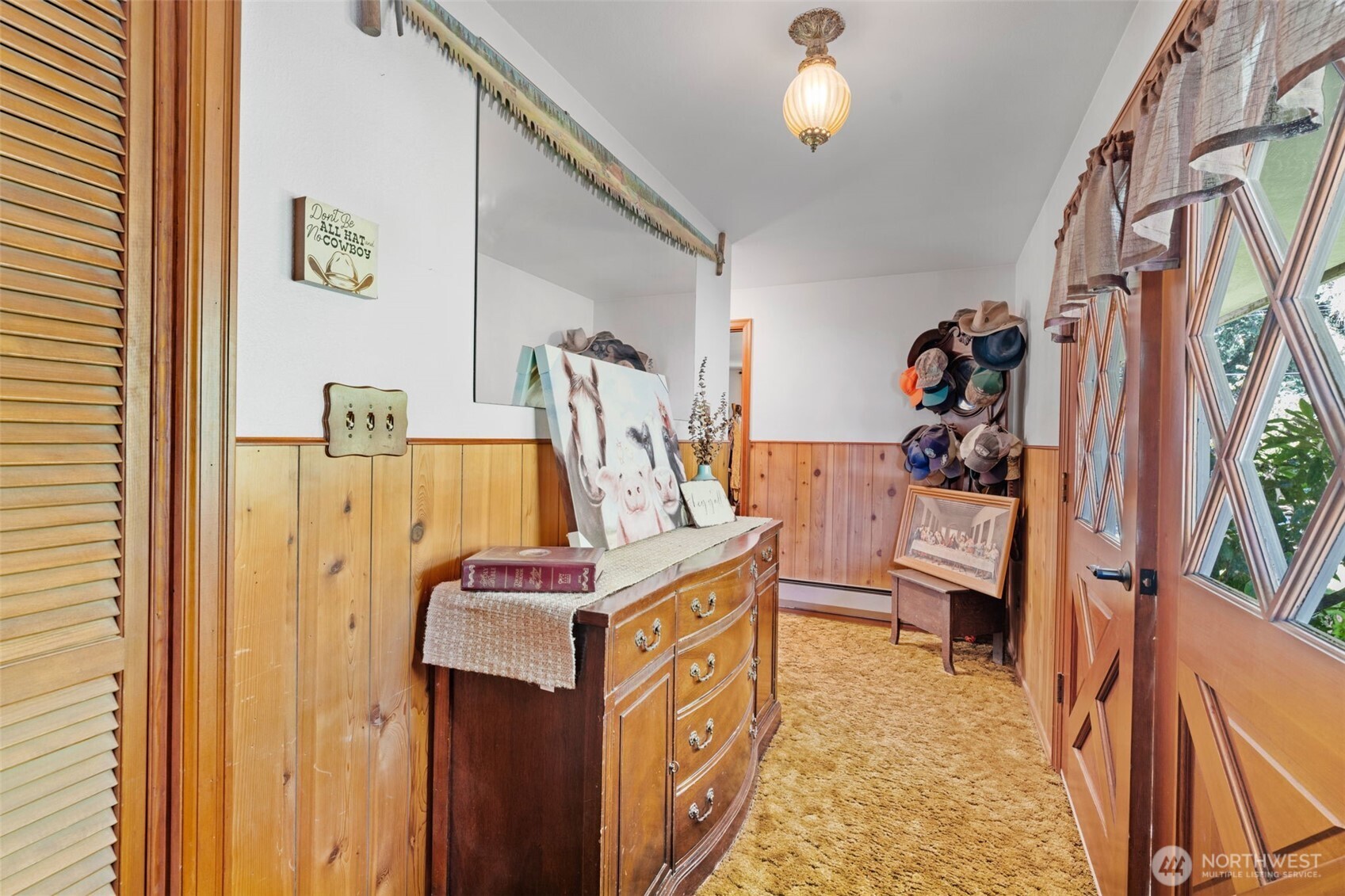 1906 164th Street South Spanaway, WA 98387 - Photo 7 of 35 a view of walk in closet with clothes and shoes